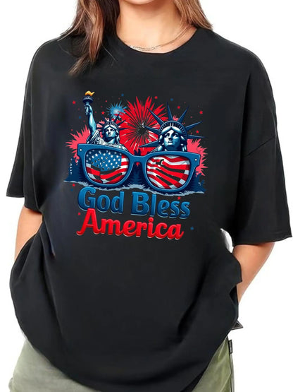 Womens Patriotic God Bless America T-Shirt - 100%25 Round Neck Short Sleeve Tee with Statue of Liberty & Flag Fashion Glasses Design, Vibrant Fireworks & Stars Print for 4th of July, Memorial Day, Juneteenth, Mothers Day - Casual Spring
